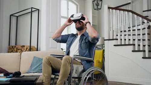 Man in Wheelchair Uses Virtual Reality Headset
