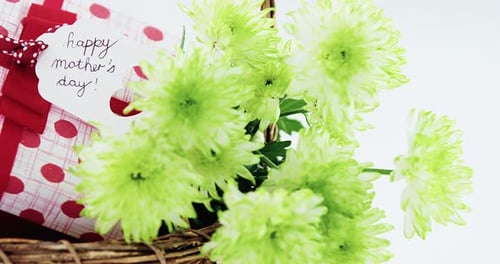 Mother's Day Gift Basket with Flowers and Present