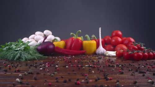 Fresh Vegetables Display with Scattered Peppercorns