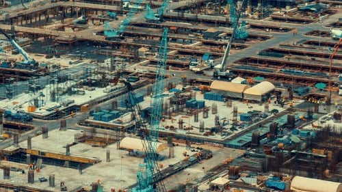 Time Lapse of Construction Site with Heavy Construction Machinery in Metropolis