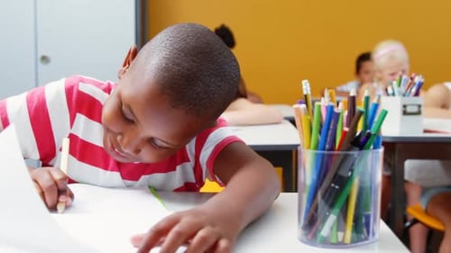 School kids doing homework in classroom