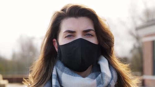 Woman Wearing Protective Reusable Barrier Mask