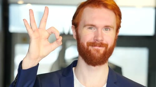 Man Giving Ok Sign Close Up Portrait