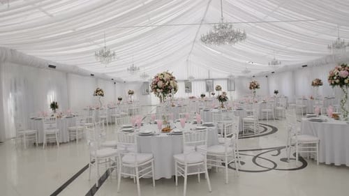 Elegant White Banquet Hall Ready for a Wedding