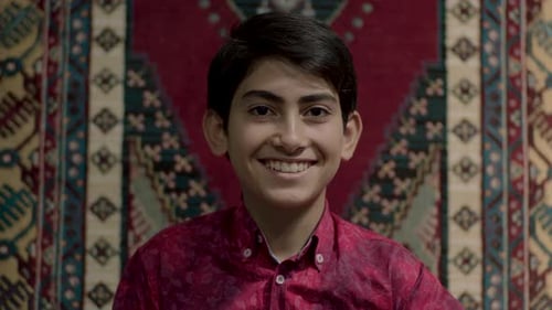 Teen Smiling Portrait with Patterned Background