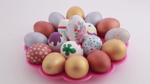 Decorated Easter Eggs on a Pink Tray