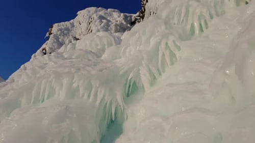 Ice and Icicles on Rocks on Lake Baikal