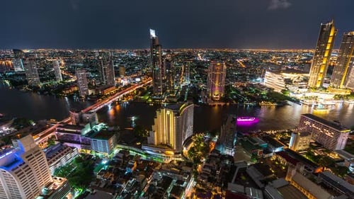motion time lapse of Bangkok city with Chao Phraya River at night, Thailand