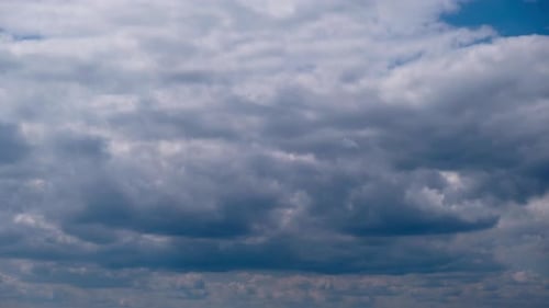Dramatic Clouds Moving Across Blue Sky Time-Lapse