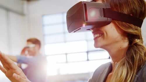 Woman Uses VR Headset in Modern Office