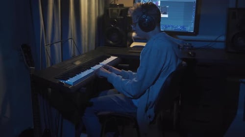 Teenager at Home Composes Music In His Home Sound Studio