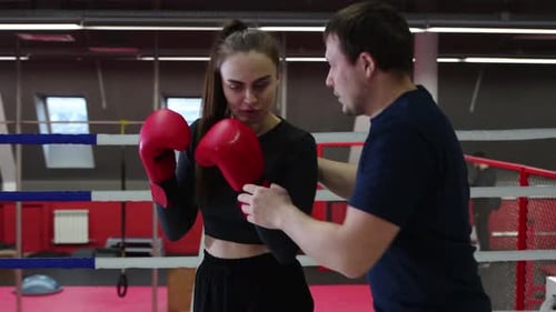 Gym Training Young Woman Training Her Boxing on the Ring with Trainer