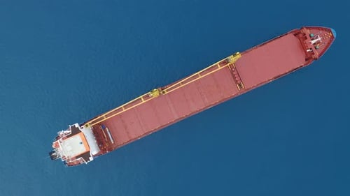 Aerial View. Cargo Ship on the Open Sea.