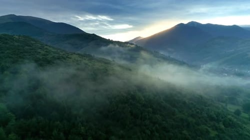 Misty Mountains at Sunrise Aerial Landscape View