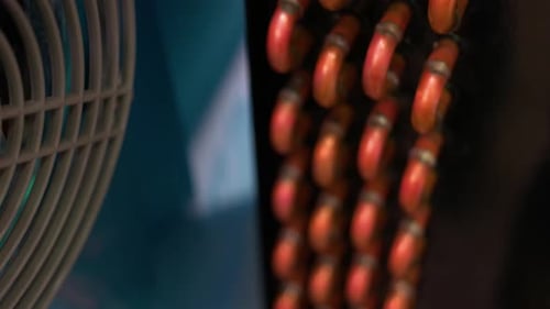 Closeup of Bent Copper Pipes with Radiator