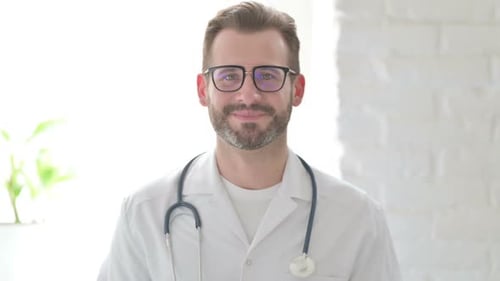 Portrait of Attractive Doctor Smiling at Camera