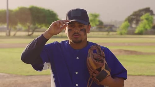 Baseball player looking at camera