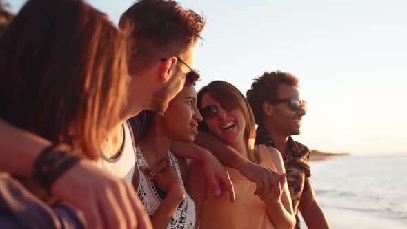 Cover for Friends Smiling Laughing Speaking Walking at Seaside at Sunrise