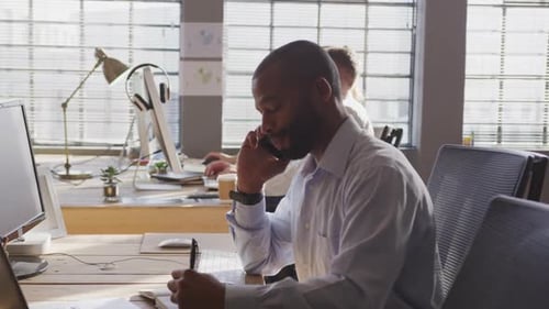 Young creative professionals working in a modern office