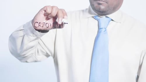 Asian Businessman Writes Credibility