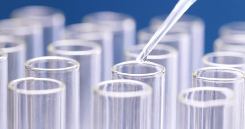 Liquid Dripping from Pipette into Test Tube