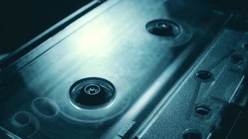 Vintage Audio Cassette Tape Spinning Close-Up