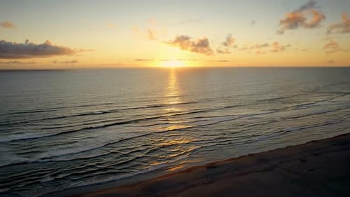 Beautiful Aerial View Sunset Over Sea Ocean Waves Crashing on Beach