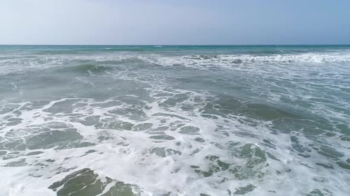 Powerful Stormy Sea Waves Crashing Wave Line in the Mediterranean Sea with Foamy White Texture