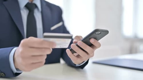 Close Up of Online Payment on Smartphone By Businessman
