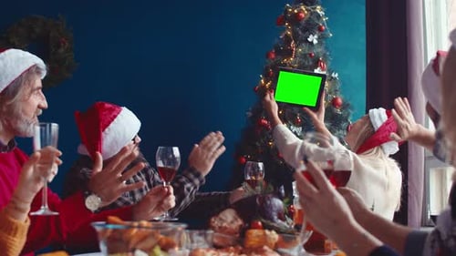 Family Christmas Celebration With Tablet Video Call