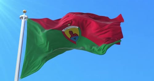 Flag of Santo Domingo de los Colorados Waving Against Blue Sky