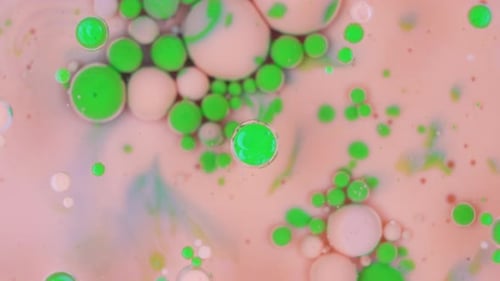 Pink and Green Ink Bubbles Background Texture Rotating