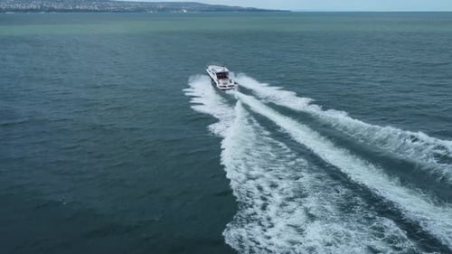 Aerial Top Down View of Speed Motor Boat on Open Sea at Summer Day