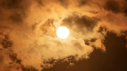 Golden Sun Shining Through Dramatic Cloudscape