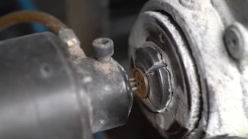 Sparks Flying from Metal Machine During Operation