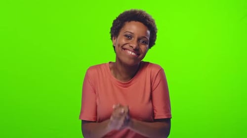 Excited Woman Reacts Positively on Green Screen