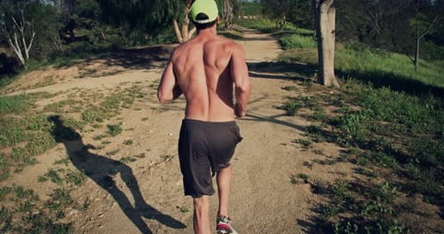 Athletic Male Trail Running Slow-Motion