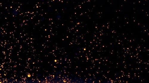 Glühpartikel fließen in der Luft auf schwarzem Hintergrund, glitzernder Glitzerstaub