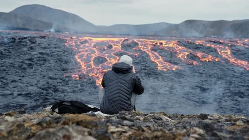 Volcano Lava Field Landscape with Person Sitting