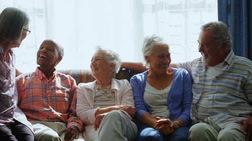 Seniors Friends Gather Together Smiling and Laughing