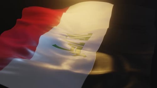 Realistic Waving National Flag with Green Emblem on Red White Black Stripes