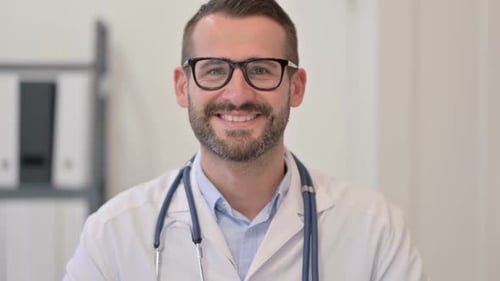 Smiling Doctor Portrait in White Coat and Glasses