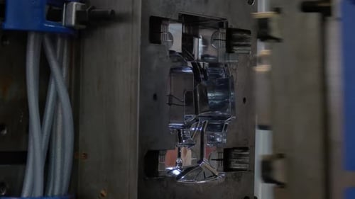Close Up Injection Molding Machine in Action