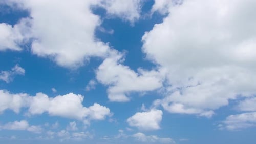 Billowing White Clouds on Blue Sky