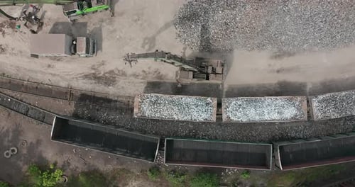 Aerial View, Vast Excavation Site with an on Going Operation of Excavators Loading Stones on To