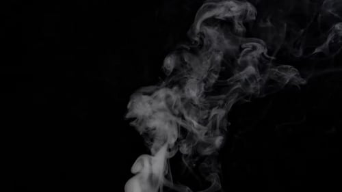 Slow Motion Water Mist Puff Stream Over Black Background