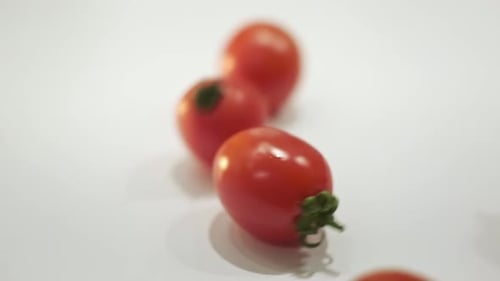 Close Up of Cherry Tomatoes on White Surface