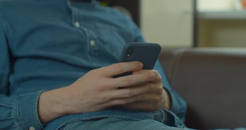 Hands of Young Man Using Smartphone at Home Office. Communication, Online Shopping, Chat, Social
