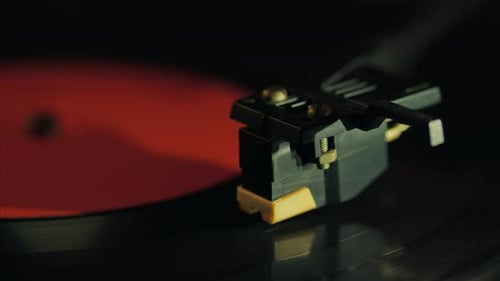 Record Player Needle on Spinning Vinyl Record