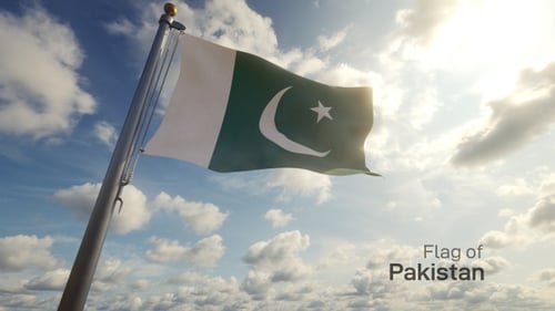 Pakistan Flag Waving on a Pole Against a Sunny Sky